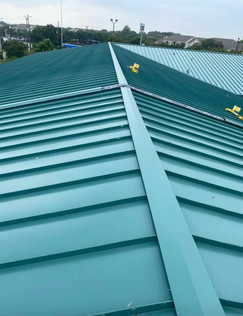 Green commercial metal roof ridge and valley for Metal Roof Repair in Grants